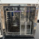 Interior stainless steel racks and chamber of the Custom Biogenic Systems 2101-MPI freezer.