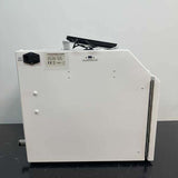 Side view of Custom Biogenic Systems freezer showing power input and main switch.