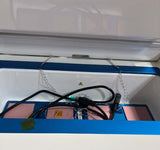 Open VIA Freeze Quad chamber showing the blue sample area and cables inside.