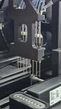 Close-up of 8-channel precision dispensing head on Nexar Araya system.